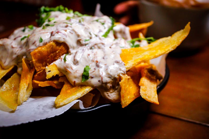 Chuys nacho grande platter with all the toppings